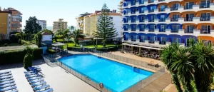Hotel Monarque Fuengirola swimming pool area with empty pool.