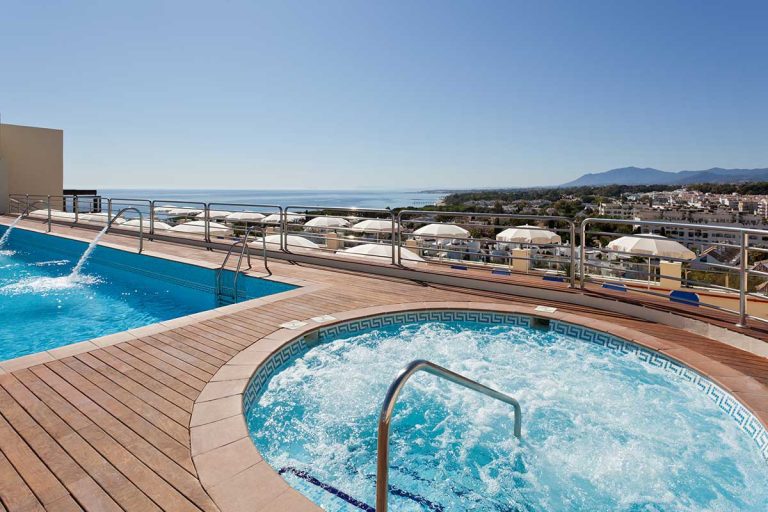 Roof top pool at the Hotel Senator Marbella with lovely coastal views.