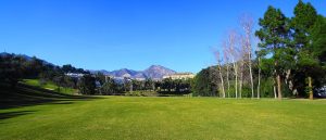 View of one of the fairways at Torrequebrada Golf with the Sierras de Mijas in the background.
