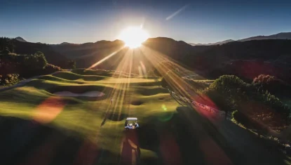 The rolling fairways of the Zagaleta New course with the sun shining down.